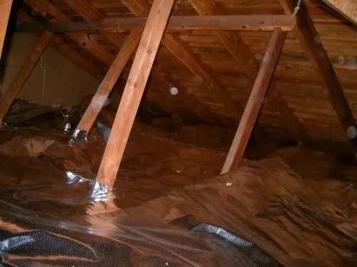 Ra-flect radiant barrier installed over attic floor insulation