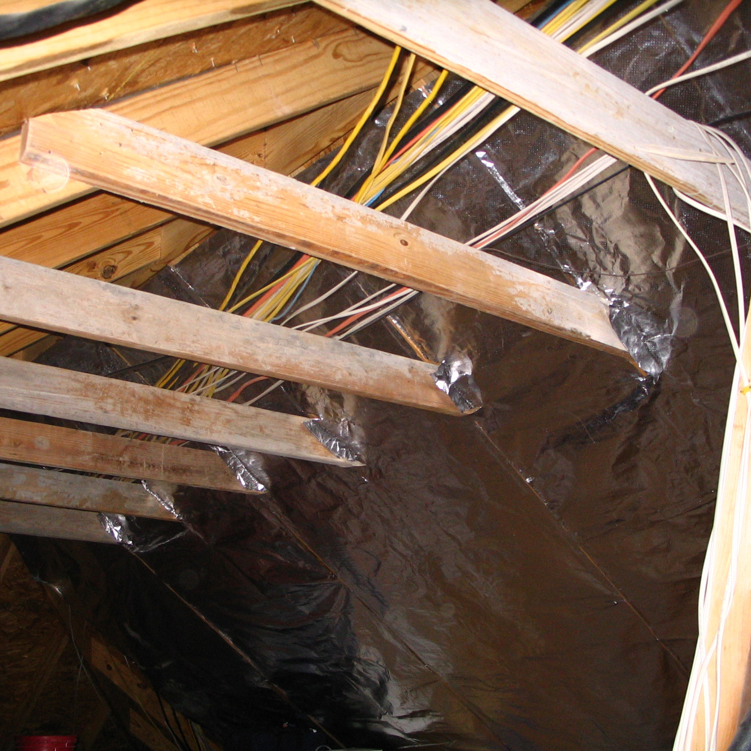 Ra-flect radiant barrier installed beneath existing attic roof rafters